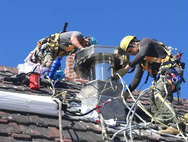 Protective chimney cap installed by Mansfield Chimney Sweep in Mansfield, CT