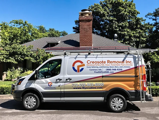 Mansfield Chimney Sweep technician removing creosote safely in Mansfield, CT